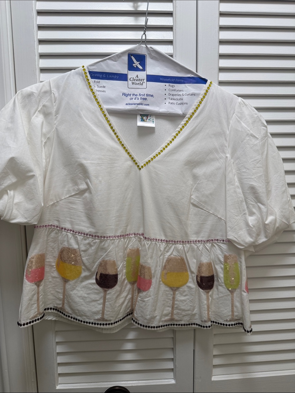 QUEEN OF SPARKLES White V-Neck Peplum Top with Multicolor Wine Glass Trim